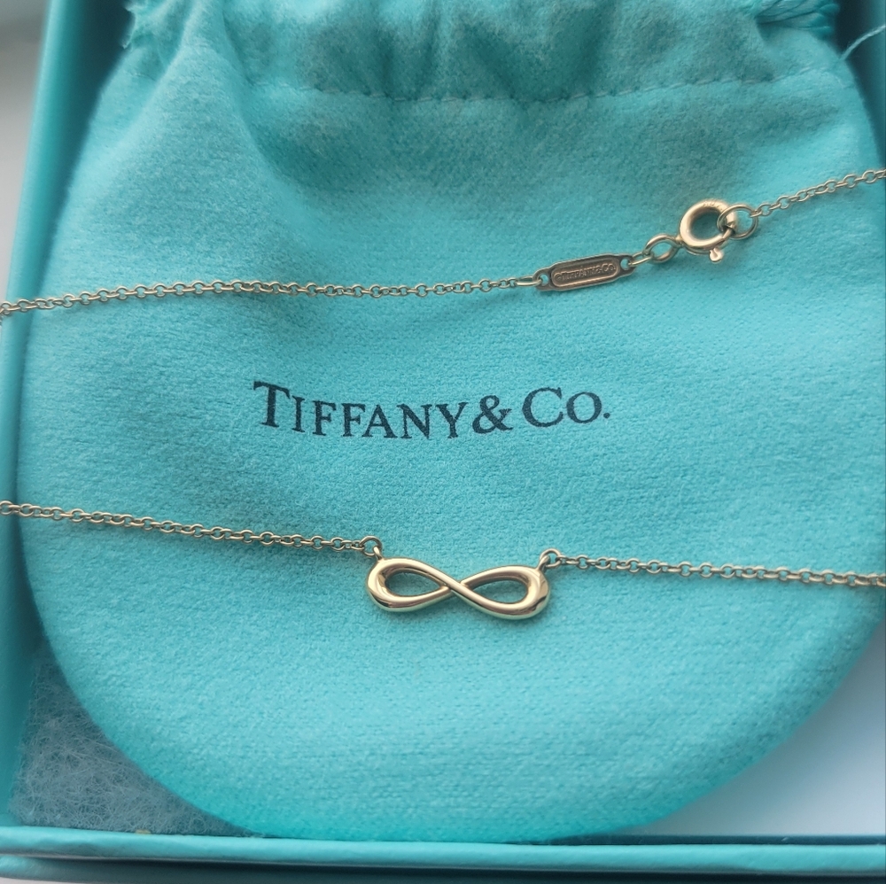 Tiffany & Co. 18k Gold infinity necklace